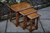 A SOLID OAK NEST OF THREE TABLES SIDE END COFFEE LAMP OCCASIONAL TABLES.