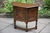 A WOOD BROTHERS OLD CHARM LIGHT OAK CABINET CANTED LAMP TABLE HALL CUPBOARD.