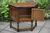 A WOOD BROTHERS OLD CHARM LIGHT OAK CABINET CANTED LAMP TABLE HALL CUPBOARD.