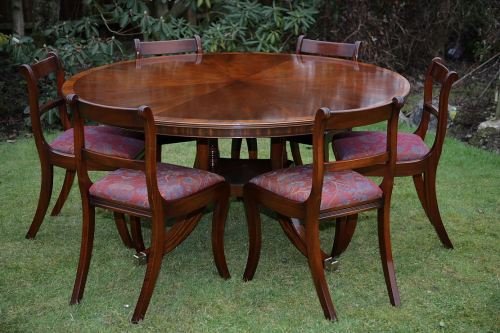 A Bevan Funnell Reprodux Mahogany Round, Mahogany Round Dining Table Sets