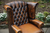 A THOMAS LlOYD ANTIQUE BROWN LEATHER CHESTERFIELD BUTTON WING-BACK SOFA SUITE ARMCHAIR.