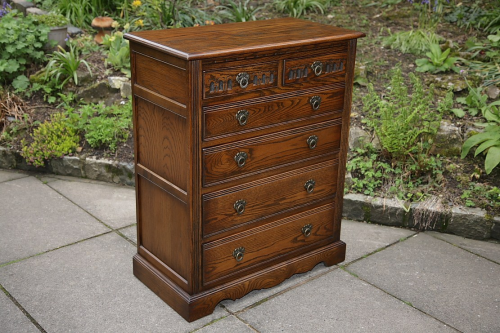 AN OLD CHARM WOOD BROS LIGHT OAK TALL CHEST BEDROOM DRESSING TABLE CHEST OF DRAWERS.