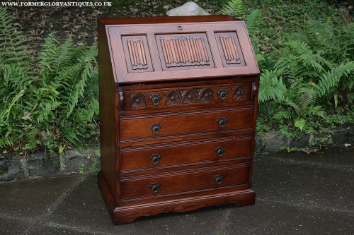 AN OLD CHARM WOOD BROS TUDOR BROWN WRITING TABLE BUREAU COMPUTER OFFICE DESK CHEST OF DRAWERS.