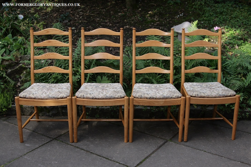 A SET OF FOUR ERCOL LIGHT ELM LADDERBACK PENN KITCHEN DINING TABLE CHAIRS + CUSHIONS PADS.