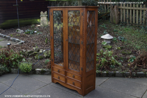 A JAYCEE OLD CHARM AUTUMN GOLD OAK DISPLAY CABINET CUPBOARD BOOKCASE SHELVES CHEST OF DRAWERS.
