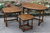 AN OLD CHARM NEST OF THREE OVAL LIGHT OAK COFFEE SIDE END OCCASIONAL LAMP TABLES.