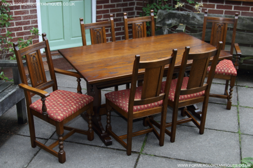 AN OLD CHARM WOOD BROTHERS LIGHT OAK REFECTORY KITCHEN DINING TABLE AND SIX DINING CHAIRS ARMCHAIRS
