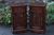 A PAIR OF OLD CHARM WOOD BROTHERS TUDOR BROWN OAK BEDSIDE TABLES / PEDESTAL CABINETS / CUPBOARDS