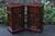 A PAIR OF OLD CHARM WOOD BROTHERS TUDOR BROWN OAK BEDSIDE TABLES / PEDESTAL CABINETS / CUPBOARDS