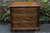 AN OLD CHARM WOOD BROTHERS LIGHT OAK SMALL CHEST OF DRAWERS