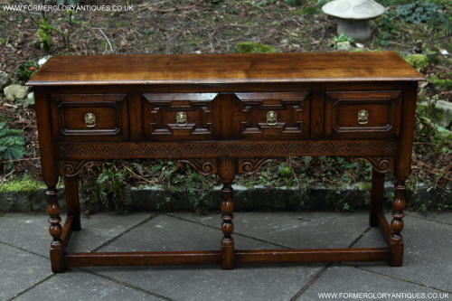 A TITCHMARSH AND GOODWIN SOLID CARVED OAK DRESSER BASE SIDEBOARD HALL SIDE LAMP PHONE TABLE.