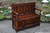 A CARVED OAK BOX SETTLE ARMCHAIR HALL MONKS SEAT BENCH PEW BLANKET CHEST