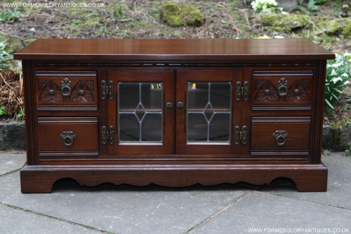 AN OLD CHARM TUDOR BROWN CARVED OAK TV HI FI DVD CD STAND TABLE CABINET BOOKCASE