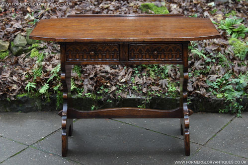 A TITCHMARSH AND GOODWIN CARVED OAK HALL  TABLE