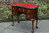 A MAHOGANY SERPENTINE FRONTED KIDNEY WRITING DESK