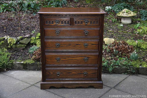 A WOOD BROTHERS OLD CHARM LIGHT OAK CHEST OF DRAWERS