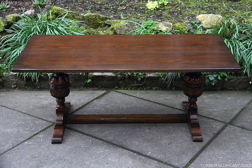 A TITCHMARSH AND GOODWIN SOLID CARVED OAK TRESTLE COFFEE TABLE