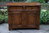 A TITCHMARSH AND GOODWIN CARVED OAK DRESSER BASE / SIDEBOARD / CUPBOARD