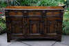 A TITCHMARSH AND GOODWIN STYLE CARVED OAK DRESSER BASE / SIDEBOARD / CUPBOARD