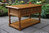 A WOOD BROTHERS OLD CHARM VINTAGE OAK TWO DRAWER COFFEE TABLE