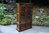 A WOOD BROTHERS OLD CHARM LIGHT OAK BOOKCASE / DISPLAY CABINET