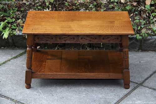 A RUPERT / NIGEL GRIFFITHS STYLE CARVED OAK COFFEE TABLE