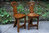 A PAIR OF RUPERT / NIGEL GRIFFITHS MONASTIC OAK COTTAGE HALL CHAIRS