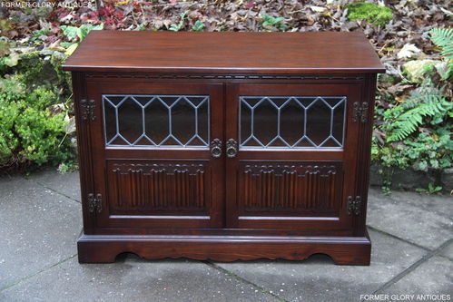A WOOD BROTHERS OLD CHARM TUDOR BROWN CARVED OAK TV CABINET / STAND