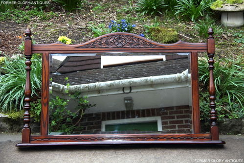 A WOOD BROTHERS OLD CHARM TUDOR BROWN CARVED OAK WALL / OVER-MANTEL MIRROR