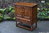 AN ERCOL GOLDEN DAWN ELM CREDENCE CUPBOARD / HALL CABINET