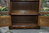 A WOOD BROTHERS OLD CHARM LIGHT OAK BOOKCASE / DISPLAY CABINET