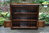 A TITCHMARSH AND GOODWIN STYLE SOLID CARVED OAK OPEN BOOKCASE / BOOKSHELVES