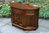 A WOOD BROTHERS OLD CHARM LIGHT OAK CANTED CUPBOARD / SIDEBOARD