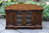 A BEVAN FUNNELL REPRODUX CARVED OAK CORNER TV CABINET / STAND