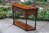 A WOOD BROTHERS OLD CHARM LIGHT OAK CANTED HALL / CONSOLE / LAMP TABLE