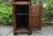 A TITCHMARSH AND GOODWIN CARVED OAK MINIATURE CORNER DISPLAY CABINET / CUPBOARD
