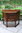A WOOD BROTHERS OLD CHARM LIGHT OAK CANTED CABINET / HALL TABLE