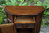A WOOD BROTHERS OLD CHARM CARVED LIGHT OAK CANTED CABINET / CUPBOARD
