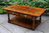 A TITCHMARSH AND GOODWIN EPICORMIC STRESSED OAK TWO DRAWER COFFEE TABLE