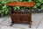 A WOOD BROTHERS OLD CHARM CARVED LIGHT OAK COFFEE TABLE / MAGAZINE RACK