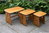 AN ERCOL WINDSOR LIGHT ELM NEST OF THREE TABLES / COFFEE TABLE SET