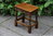 A NIGEL GRIFFITHS MONASTIC SOLID CARVED OAK OCCASIONAL / COFFEE TABLE