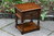 A WOOD BROTHERS OLD CHARM CARVED LIGHT OAK LAMP TABLE
