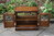 A WOOD BROTHERS OLD CHARM CARVED LIGHT OAK TV MEDIA CABINET / STAND / BASE