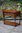 A WOOD BROTHERS OLD CHARM LIGHT OAK CANTED HALL / CONSOLE / LAMP TABLE