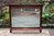 A WOOD BROTHERS OLD CHARM TUDOR BROWN CARVED OAK WALL / OVERMANTEL MIRROR