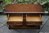A WOOD BROTHERS OLD CHARM CARVED LIGHT OAK TWO DRAWER COFFEE TABLE