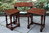A TITCHMARSH AND GOODWIN NEST OF THREE STRESSED OAK TABLES / COFFEE TABLE SET
