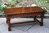 A WOOD BROTHERS OLD CHARM CARVED LIGHT OAK COFFEE TABLE