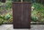 A TITCHMARSH AND GOODWIN SOLID STRESSED OAK DRINKS CABINET / WINE CUPBOARD
